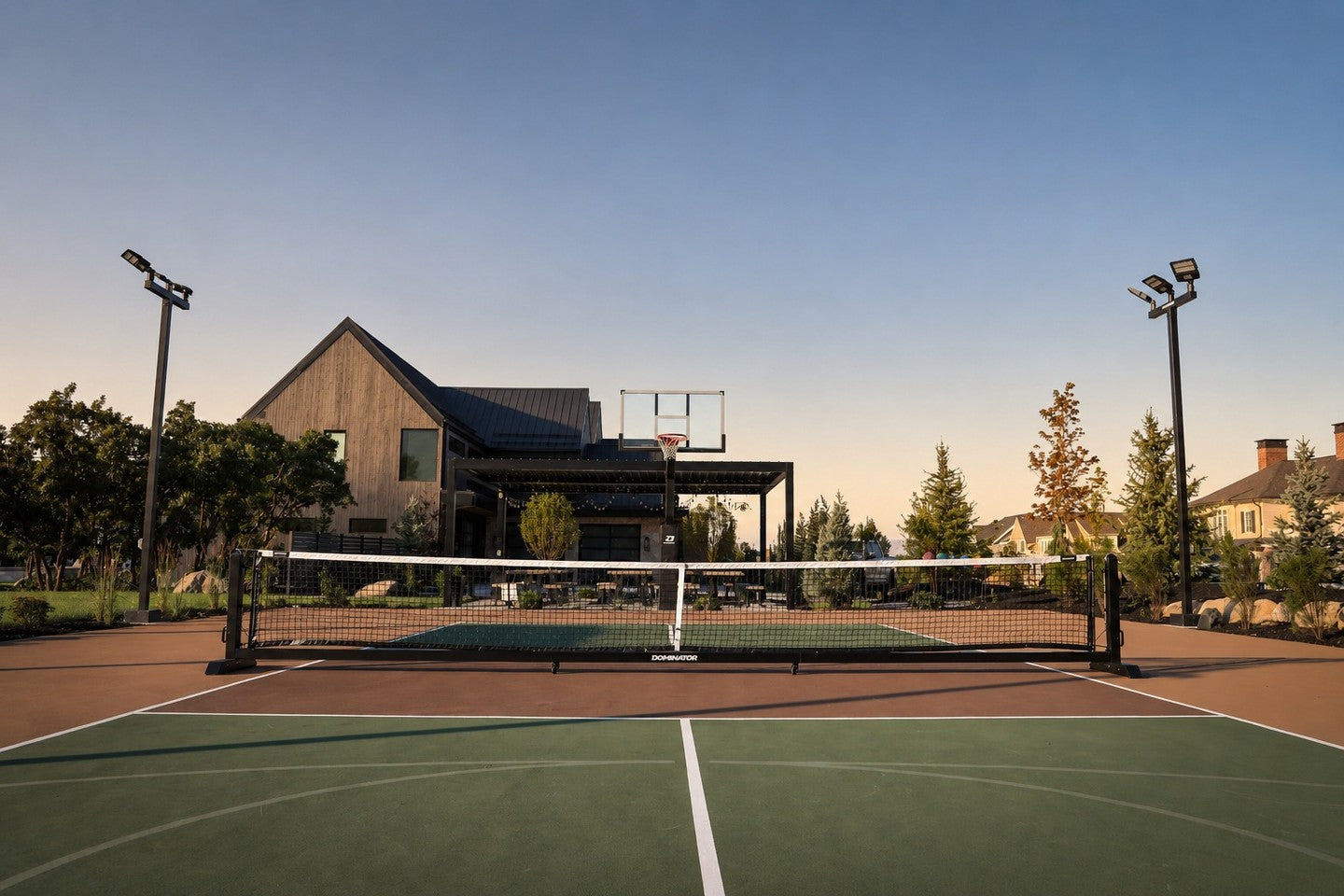 Backyard court with Dominator basketball, pickleball, and light systems